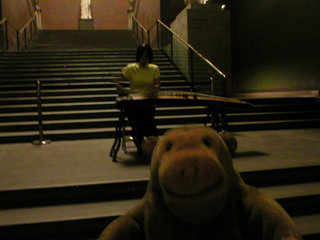 Mr Monkey watching a Chinese musician at the British Museum