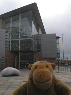 Mr Monkey looking at the front of the Bridgewater Hall