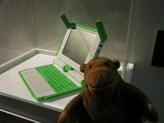 Mr Monkey examining the OLPC laptop