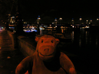 Mr Monkey watching the Hungerford bridge at night