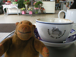 Mr Monkey with a Bibendum coffee cup
