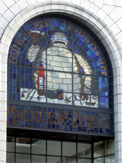 The Bibendum stained glass panel on the front of the Bibendum building