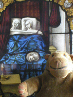 Mr Monkey with a picture of some German stained glass
