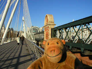 Mr Monkey looking along the western Hungerford footbridge