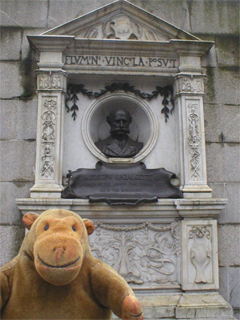 Mr Monkey looking at the Bazalgette monument on the Embankment