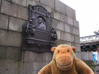 Mr Monkey looking at the W.S. Gilbert monument on the Embankment