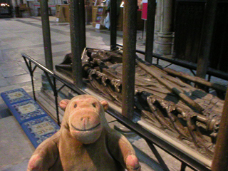 Mr Monkey looking at at a tomb in St Michael's Chapel