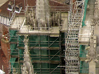 One of the pinnacles on the east end of the Minster shrouded in scaffolding