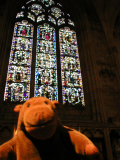 Mr Monkey looking at one of the windows in the North Quire Aisle