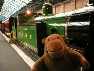 Mr Monkey looking at an LSWR Class M7 locomotive