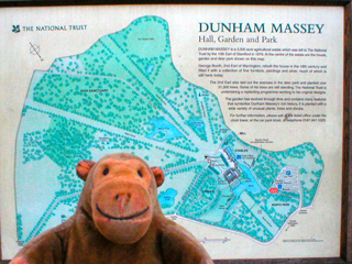 Mr Monkey examining a map of the Dunham Massey estate
