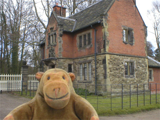Mr Monkey looking at the lodge at the end of the Carriage Drive