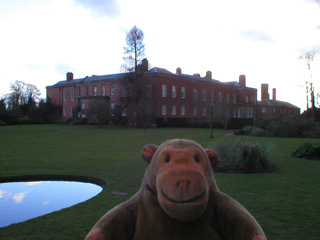 Mr Monkey looking at the house from beside the Orangery