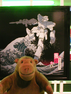 Mr Monkey looking at the Night Fighter panel of the Great Wave Diptych