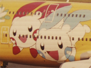 An ANA plane decorated with Pokemon characters