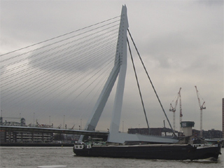 A barge passing under the Erasmusbrug