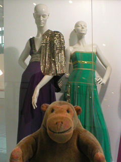 Mr Monkey looking at event dresses worn by Kiera Knightley and Sienna Miller