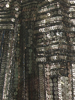 Detail of the sequins on Kiera Knightley's sequin jacket