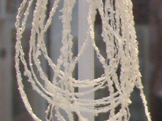 Detail of a porcelain necklace