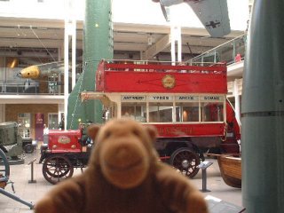 Mr Monkey with a 1914 bus in the background