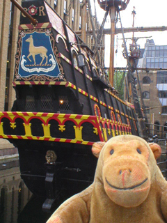Mr Monkey looking at the stern of the Golden Hinde
