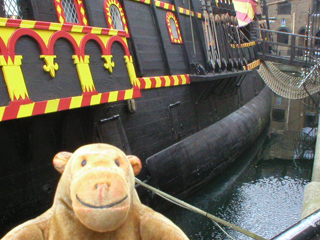 Mr Monkey looking along the side of the Golden Hinde
