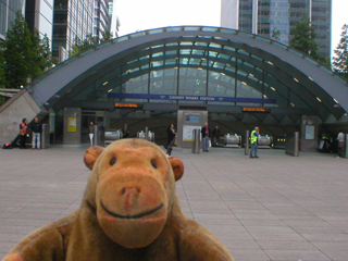 Mr Monkey outside Canary Wharf tube station
