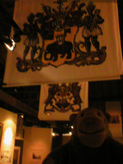 Mr Monkey looking at merchant company banners