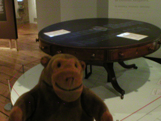 Mr Monkey looking at the Buxton table