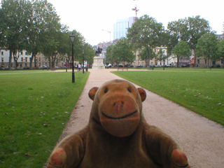 Mr Monkey walking through Queen Square