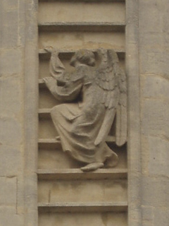 An angel climbing up Bath Abbey