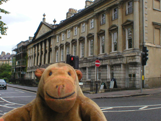Mr Monkey looking at houses on the north side of Queen Square