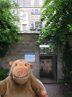 Mr Monkey looking at the door to the Georgian Garden