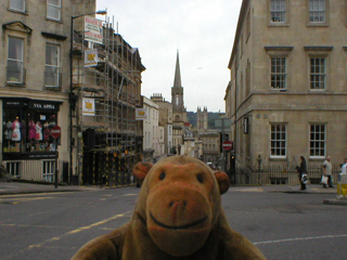 Mr Monkey looking down Broad Street to the Abbey church