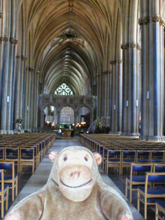 Mr Monkey looking down the nave of Bristol Cathedral