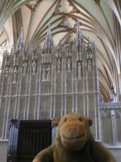 Mr Monkey looking at the back of the reredos