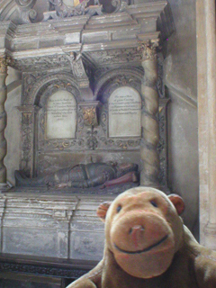 Mr Monkey looking at one of the Newton family tombs