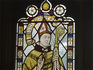A stained glass abbot