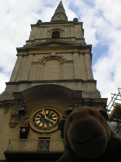 Mr Monkey looking at the tower of Christchurch
