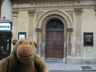 Mr Monkey looking at the door of Christchurch