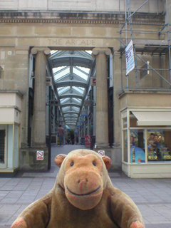 Mr Monkey looking through the Arcade from Horsefair to Broadmead