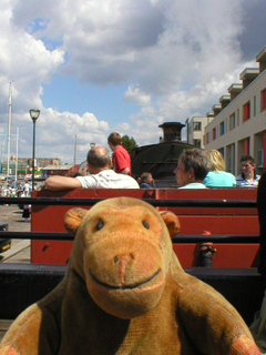 Mr Monkey on the quayside train ride looking towards the locomotive