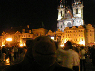 Mr Monkey in the Old Town Square at night