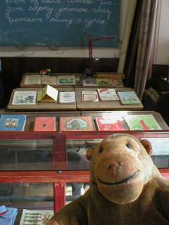 Mr Monkey looking at a Communist era schoolroom