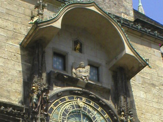 The upper section of the Astronomical Clock - two small windows under a canopy