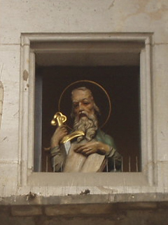 A saint with a book and a sword