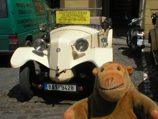 Mr Monkey looking at a 1926 Tatra from the front