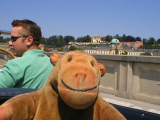 Mr Monkey looking from the Mánesův bridge