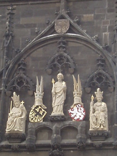 Statues above the gate of the Old Town Bridge Tower