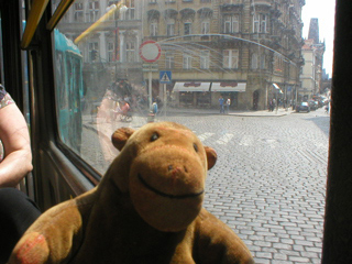 Mr Monkey on the tram on the way to the castle